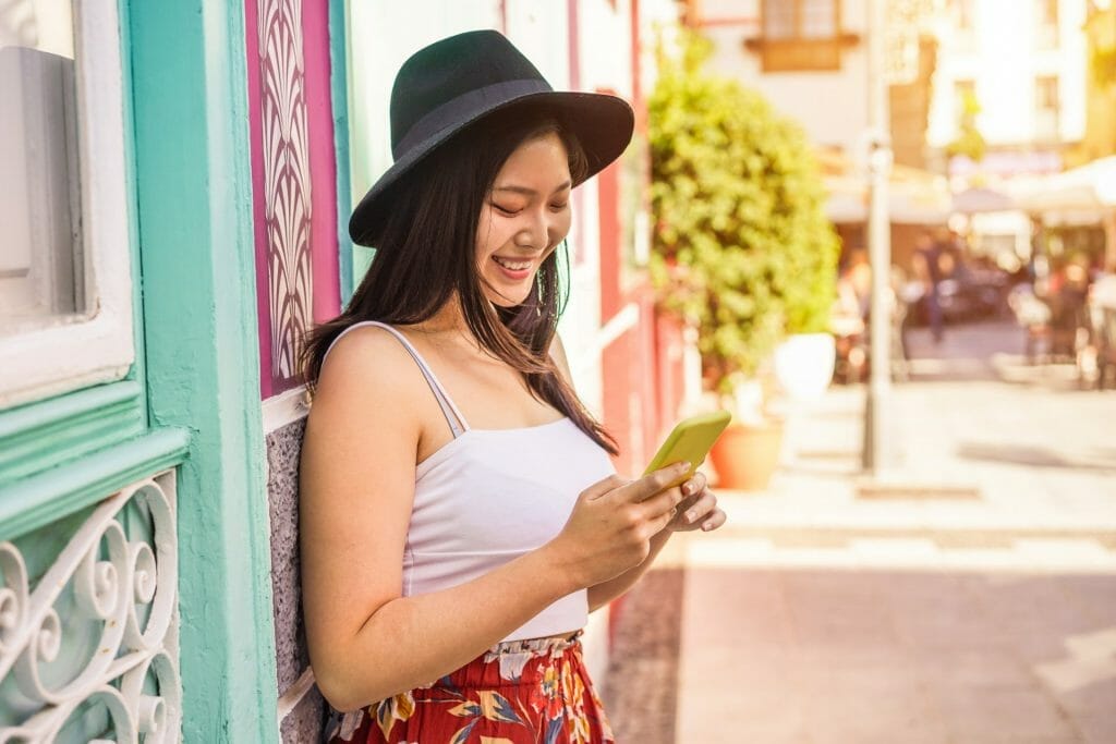 how strong branding will have a huge impact on your business 4 asian woman having fun with new trends technology - fashion, travel, tech and millennial generation activity