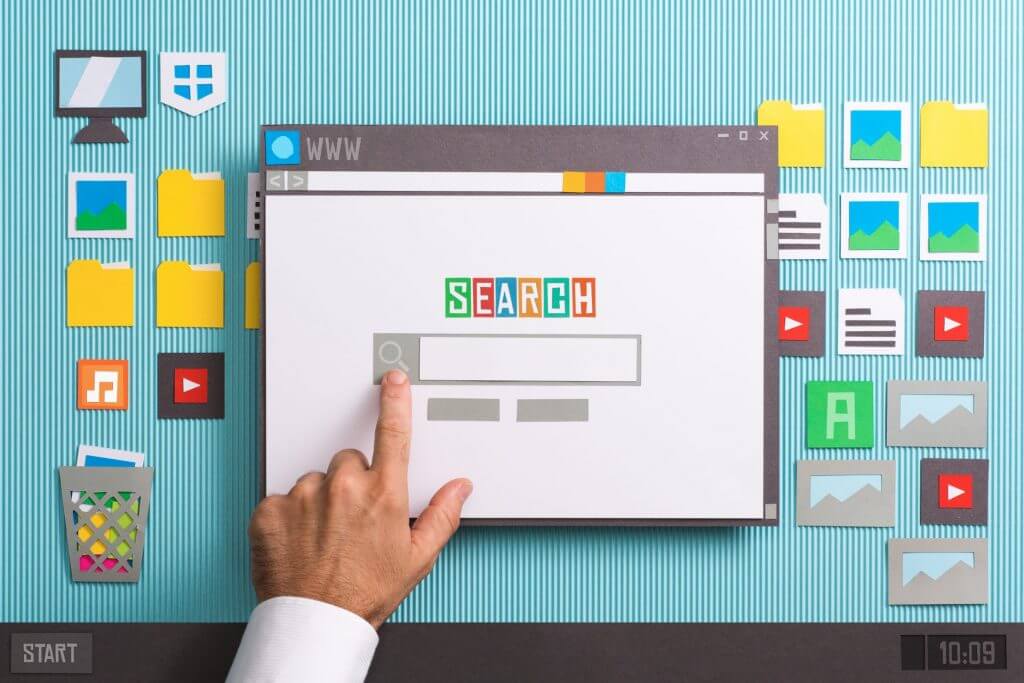 man pointing at illustration of search engine search bar.