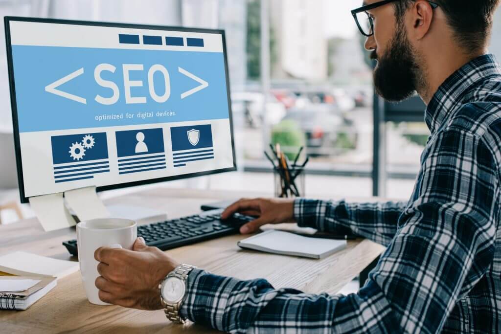 seo for ecommerce: 6 top tips for your strategy 10 web developer working on a client's on-page optimisation.