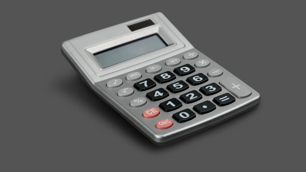 how much does logo design cost in 2022? 3 calculator on a dark background.